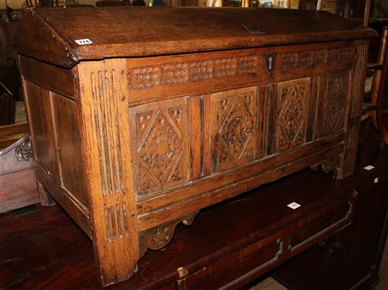 Oak carved panelled dome top coffer